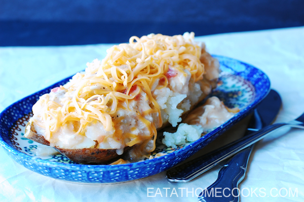 Slow Cooker King Ranch Chicken over Baked Potatoes